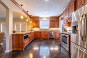 gourmet kitchen with granite counter tops